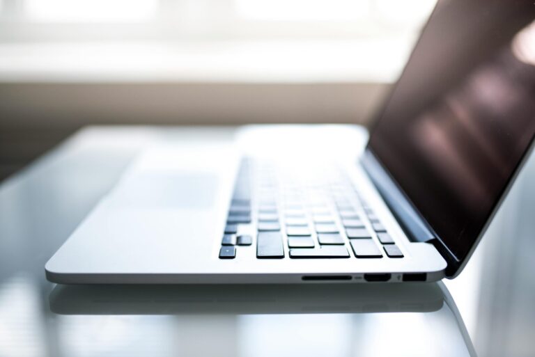 shallow-focus-photography-of-macbook
